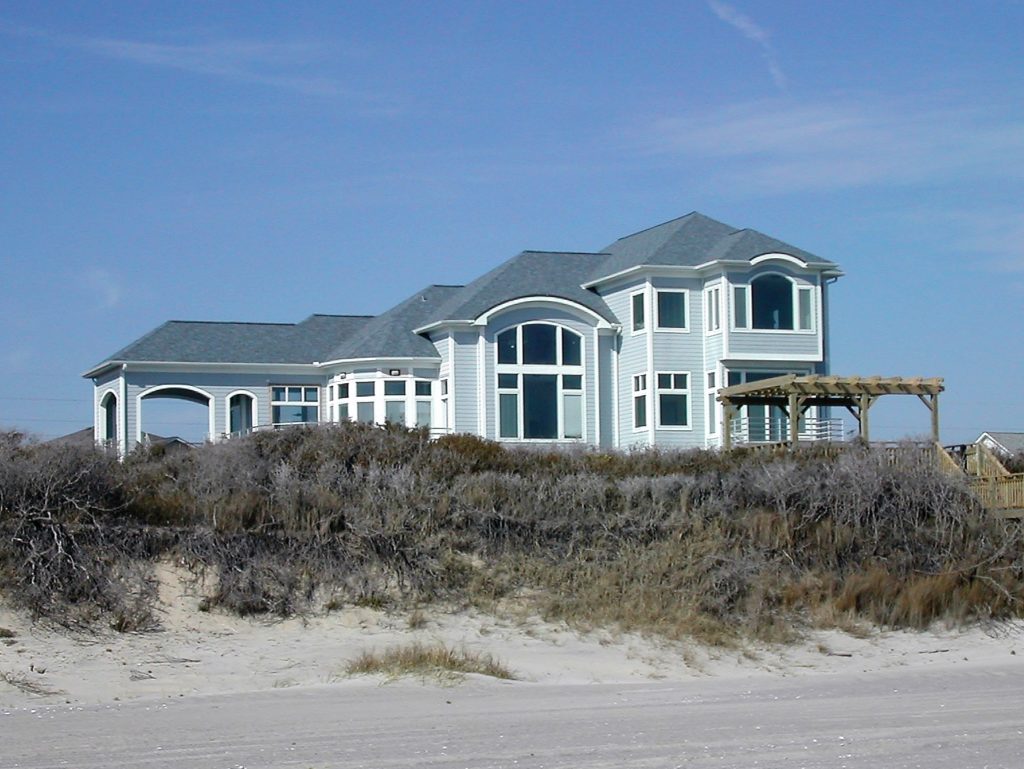 Larger lot on the ocean front allowed a spread home design