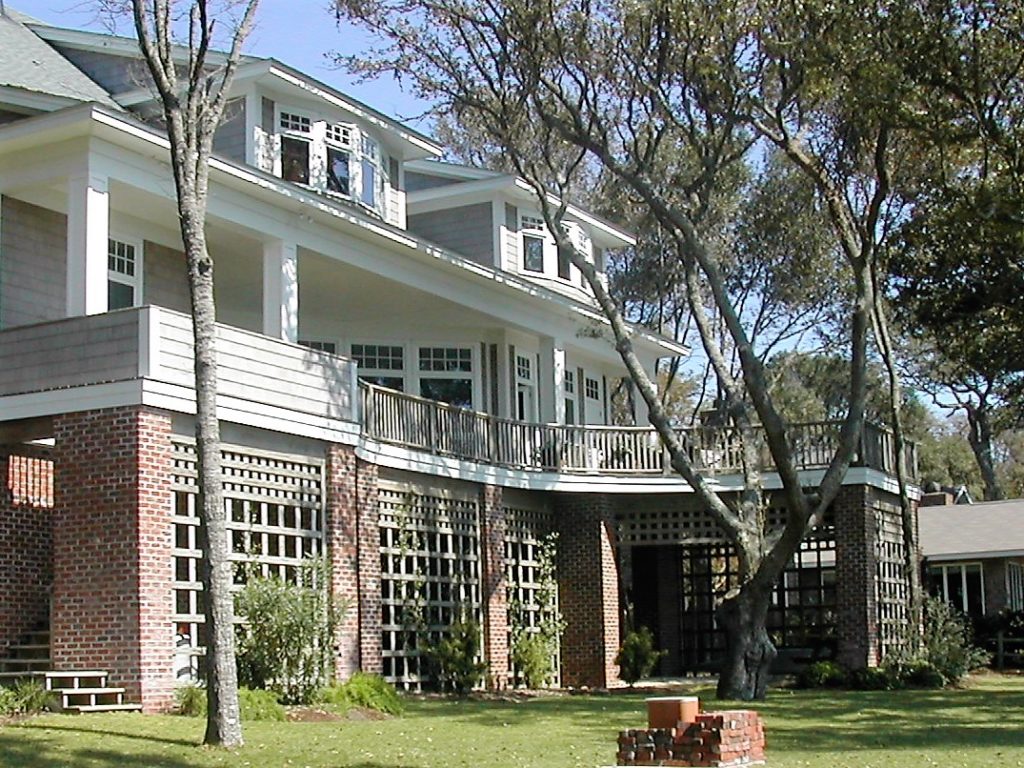 Lattice work enhances these lower level brick piers