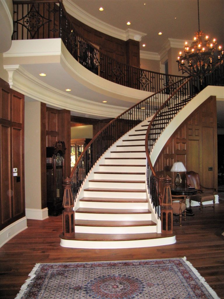 Serious traditional interior detailing this foyer space